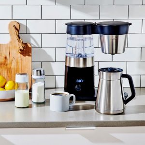 Oxo barista Brain placed on kitchen bench with two-walled steel carafe